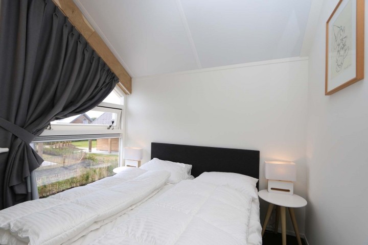 Schlafzimmer mit Doppelbett