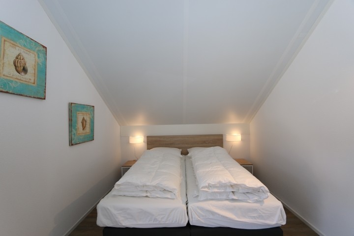 Schlafzimmer mit Doppelbett