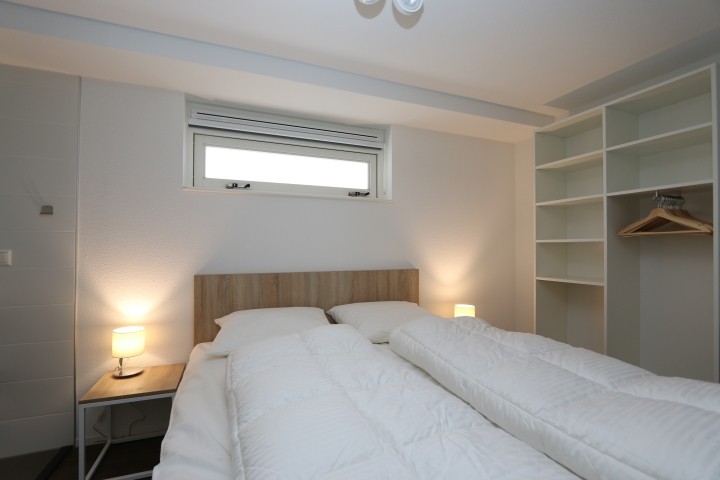 Schlafzimmer mit Doppelbett