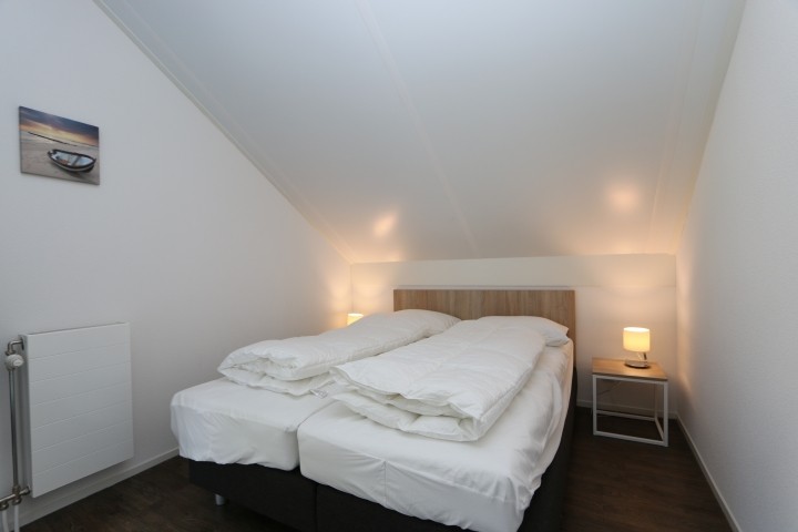 Schlafzimmer mit Doppelbett