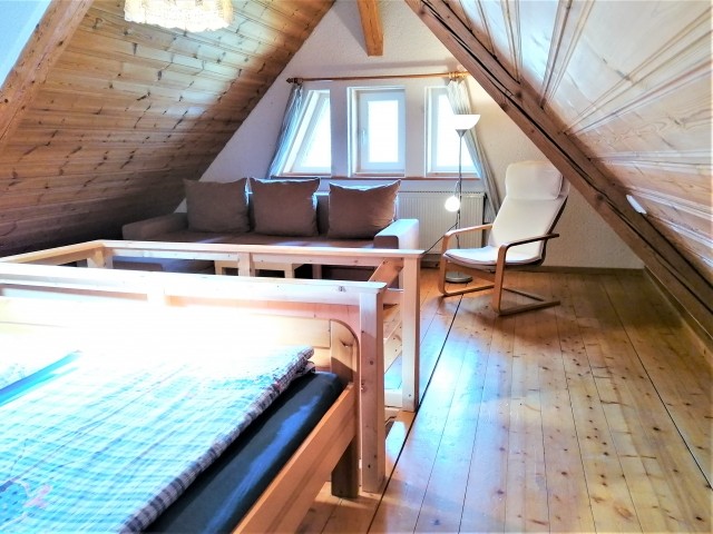 Die obere Etage bietet noch einen gemütlichen Sitzbereich