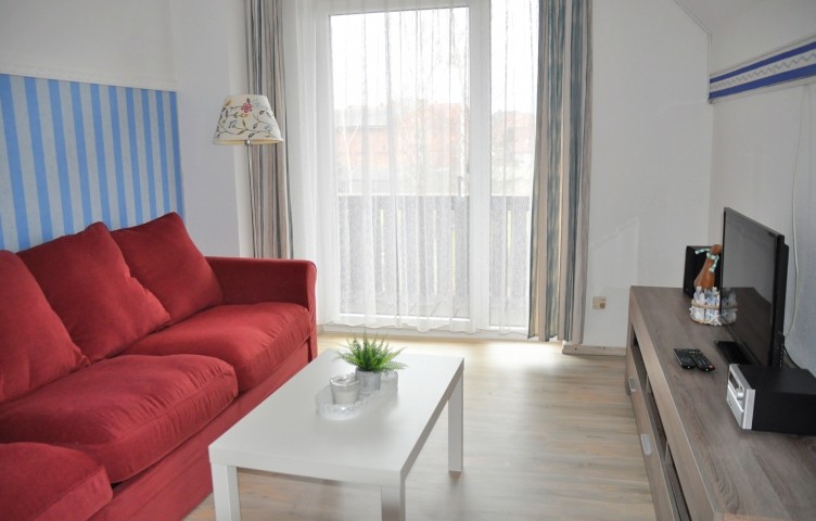 Wohnzimmer mit Schlafsofa