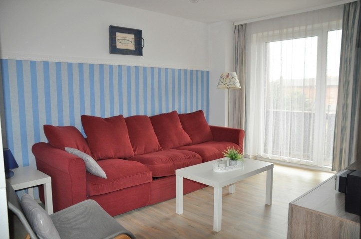 Wohnzimmer mit Schlafsofa