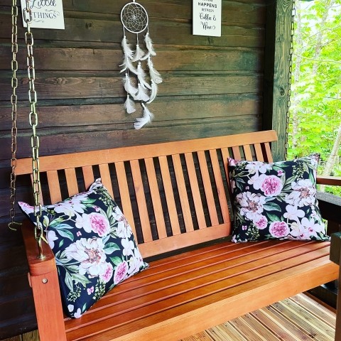 Überdachte Terrasse mit Schaukel