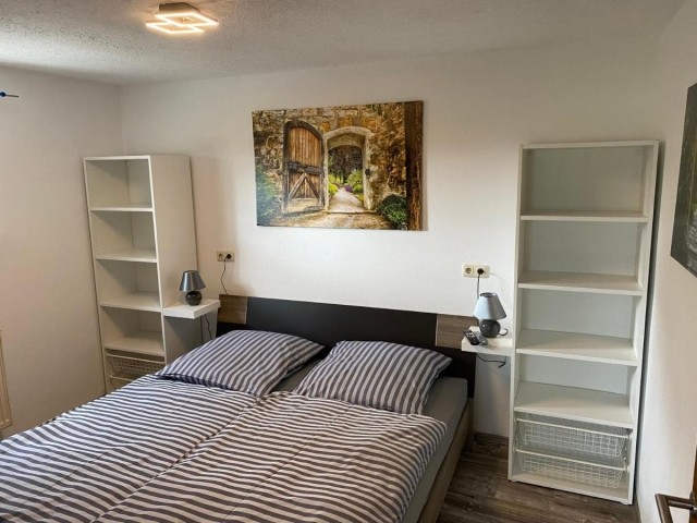 Schlafzimmer mit Doppelbett