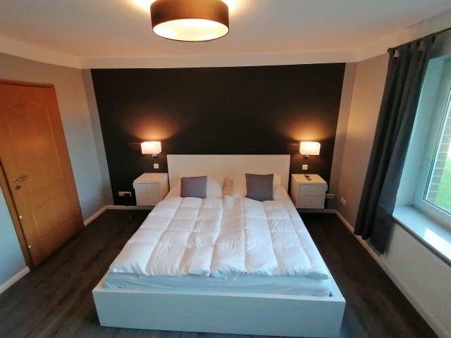 Schlafzimmer 1 mit Fernseher