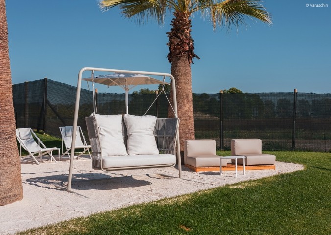 Unser Tipp: Mit Blick auf die Poollandschaft ein kühles Getränk im Clubhaus genießen