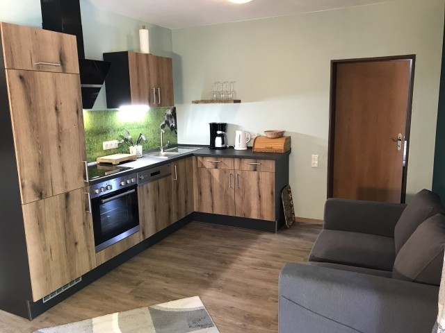 Küche mit Sofa