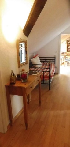 Flur mit Garderobe und Tagesbett