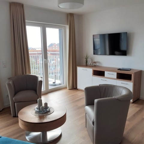 Wohnbereich/ Zugang zum Balkon