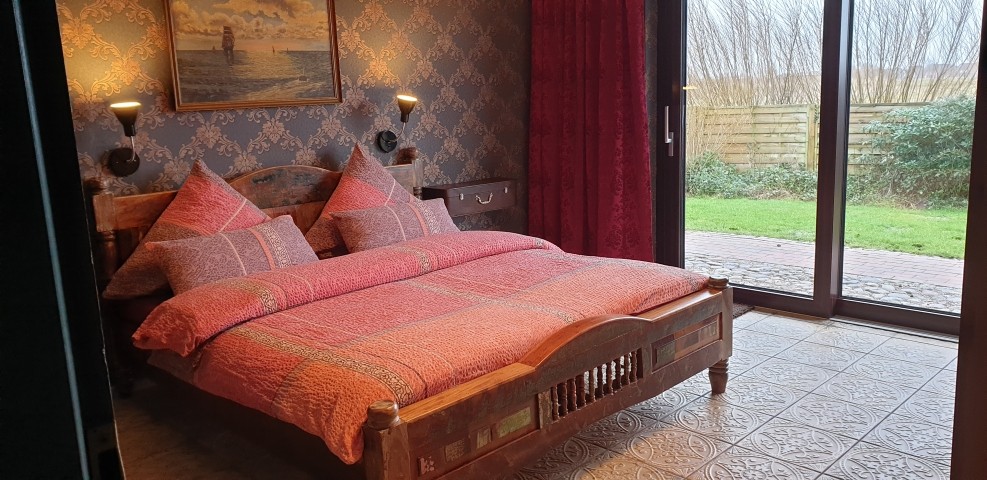 Schlafzimmer 1 EG mit Doppelbett 180x200cm
