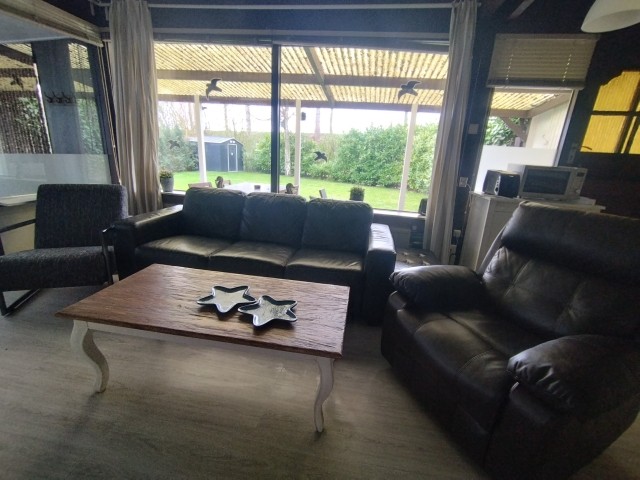 Wohnbereich mit  Sofa und Relaxsessel