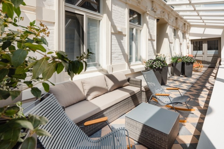 Veranda mit Loungemöbeln