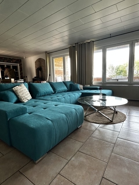 Wohnzimmer mit direktem Zugang zum Garten