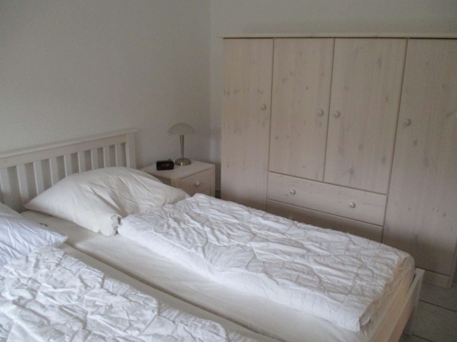 Schlafzimmer mit Doppelbett