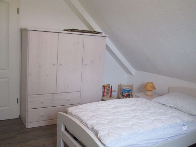 Schlafzimmer 2 mit 3 Einzelbetten