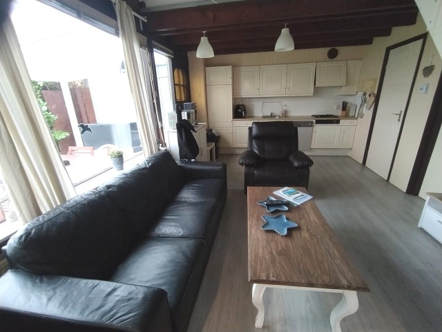 Wohnbereich mit  Sofa und Relaxsessel