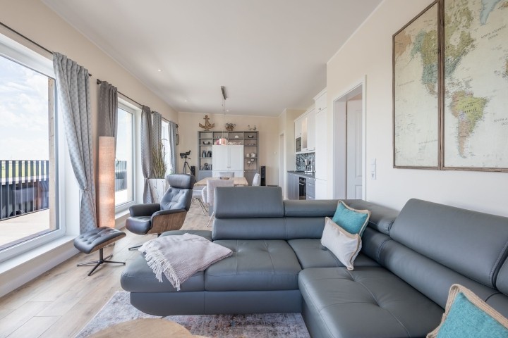 Penthouse SeeZeichen - Die große Sofalandschaft lädt zum verweilen ein 