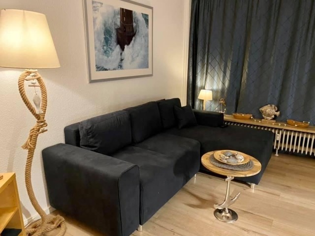 Wohnzimmer mit ausziehbarer Schlafcouch Guido Maria Kretschmer