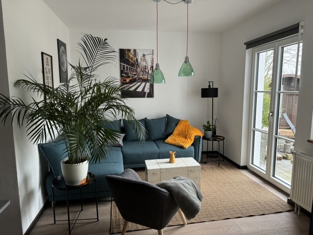Wohnzimmer mit Schlafsofa