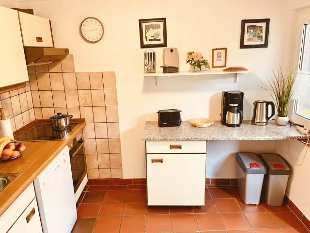 Küche mit Zugang zum Garten