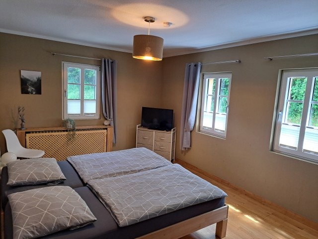 Hauptschlafzimmer mit Doppelbett
