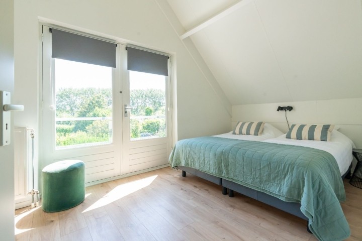 Das Hauptschlafzimmer mit 2 Einzel Boxspringbetten