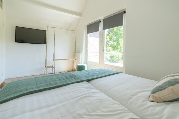 Das Hauptschlafzimmer mit 2 Einzel Boxspringbetten
