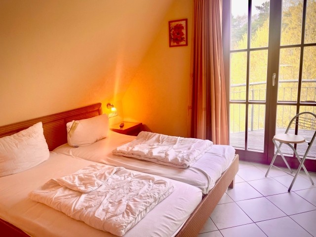 Schlafzimmer mit Balkon