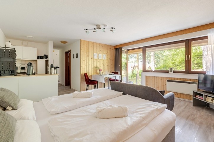 Stellen Sie sich vor: Sie wachn auf, öffnen die Terrassentür und lassen die frische Morgenluft ins Zimmer strömen - pure Entspannung!