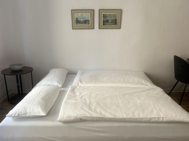 Wohnzimmer mit Schlafsofa