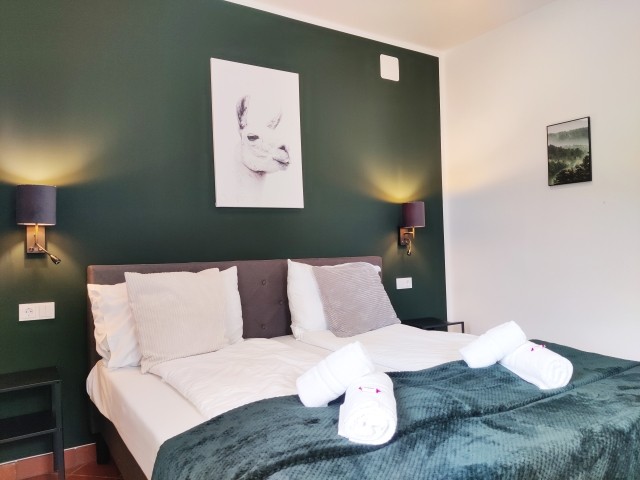 Schlafzimmer 1 mit Doppelbett 180x200cm