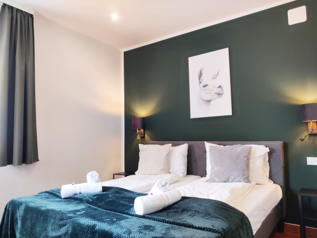 Schlafzimmer 1 mit Doppelbett 180x200cm
