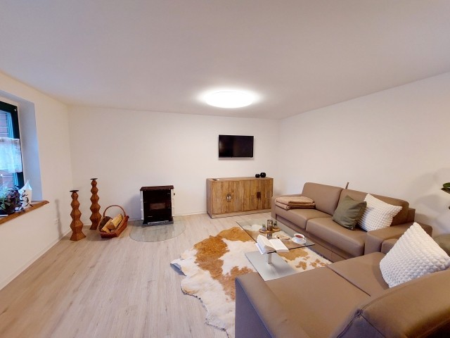 Wohnzimmer mit Schlafsofa
