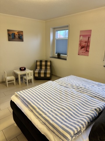Schlafzimmer mit Spielecke 