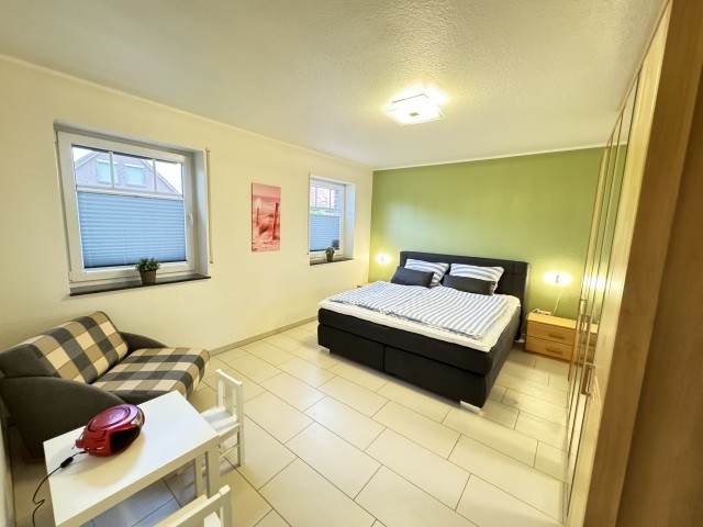 Schlafzimmer mit Spielecke 