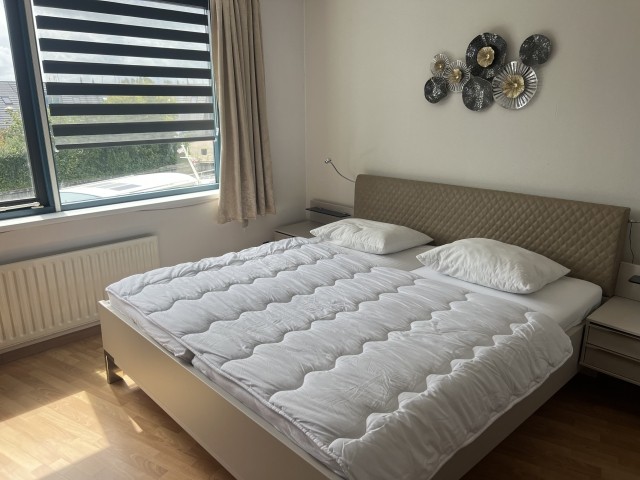 Schlafzimmer mit Doppelbett
