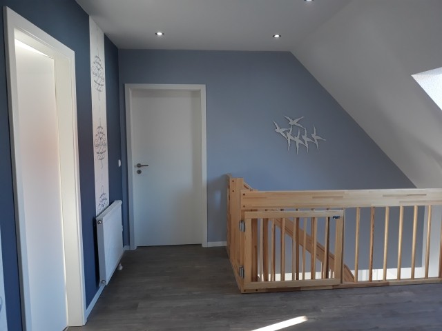 Treppe OG mit Treppenschutzgitter