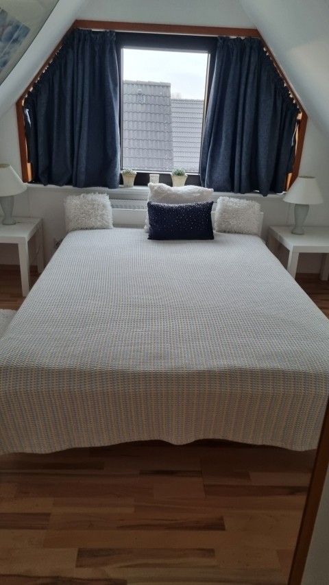 Schlafzimmer unter dem Dach
