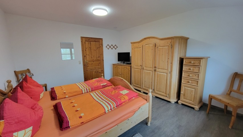 Schlafzimmer mit TV 