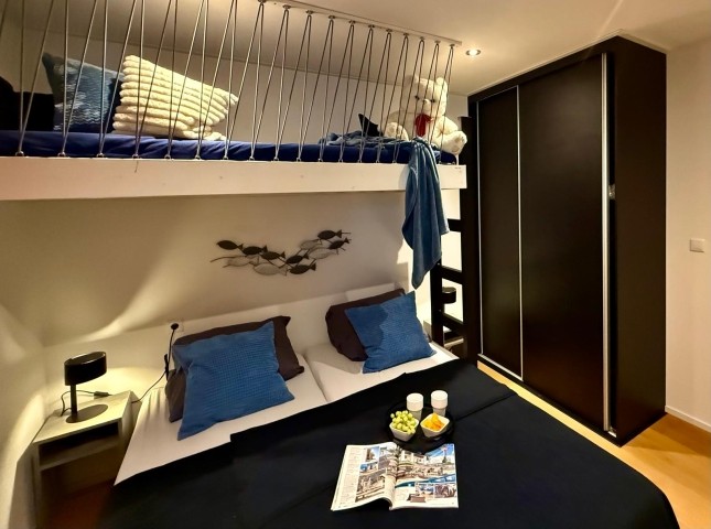 ein Schlafzimmer mit Hochbett
