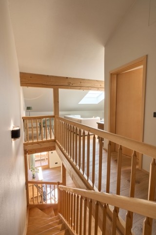 Galerie mit Wohnzimmer und den Schlafräumen