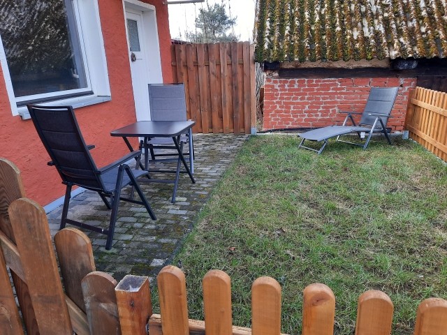 Eingezäunter Garten mit Terrasse
