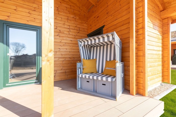 Huus Uul - Strandkorb zum Sonnen auf der überdachten Terrasse
