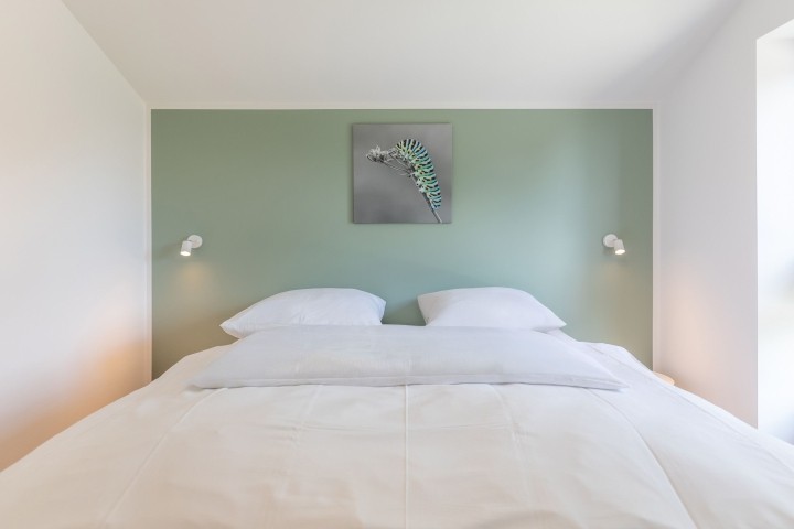 Huus Eekboom- großes Schlafzimmer mit Doppelbett Huus Eekboom- großes Schlafzimmer mit Doppelbett