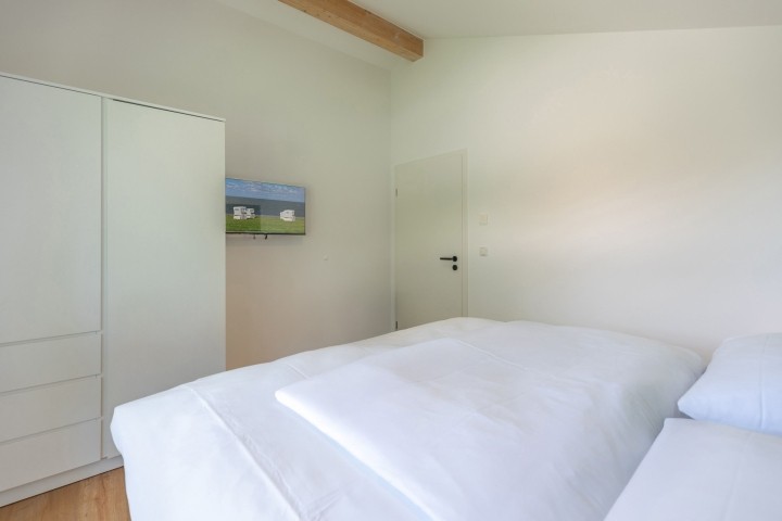 Huus Eekboom- großes Schlafzimmer mit Doppelbett Huus Eekboom- großes Schlafzimmer mit Doppelbett