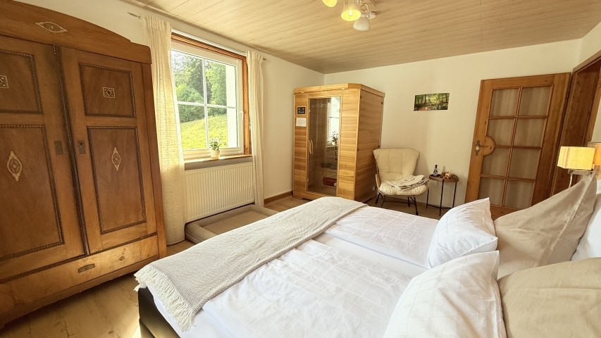 Schlafzimmer mit Infrarotsauna