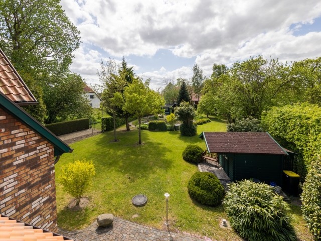 Ferienhaus Rügenbrise mit Blick in den Garten in Zudar