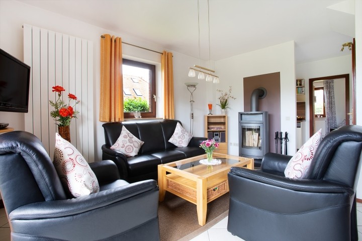 Wohnzimmer mit Kaminofen Wohnzimmer mit Kaminofen