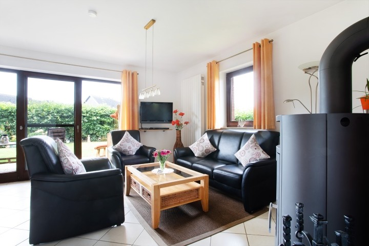 Wohnzimmer mit Kaminofen Wohnzimmer mit Kaminofen